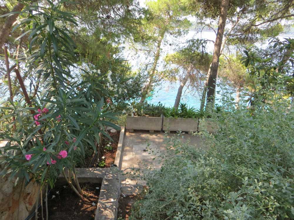 outdoors: part of mediterranean garden and seaside directly below